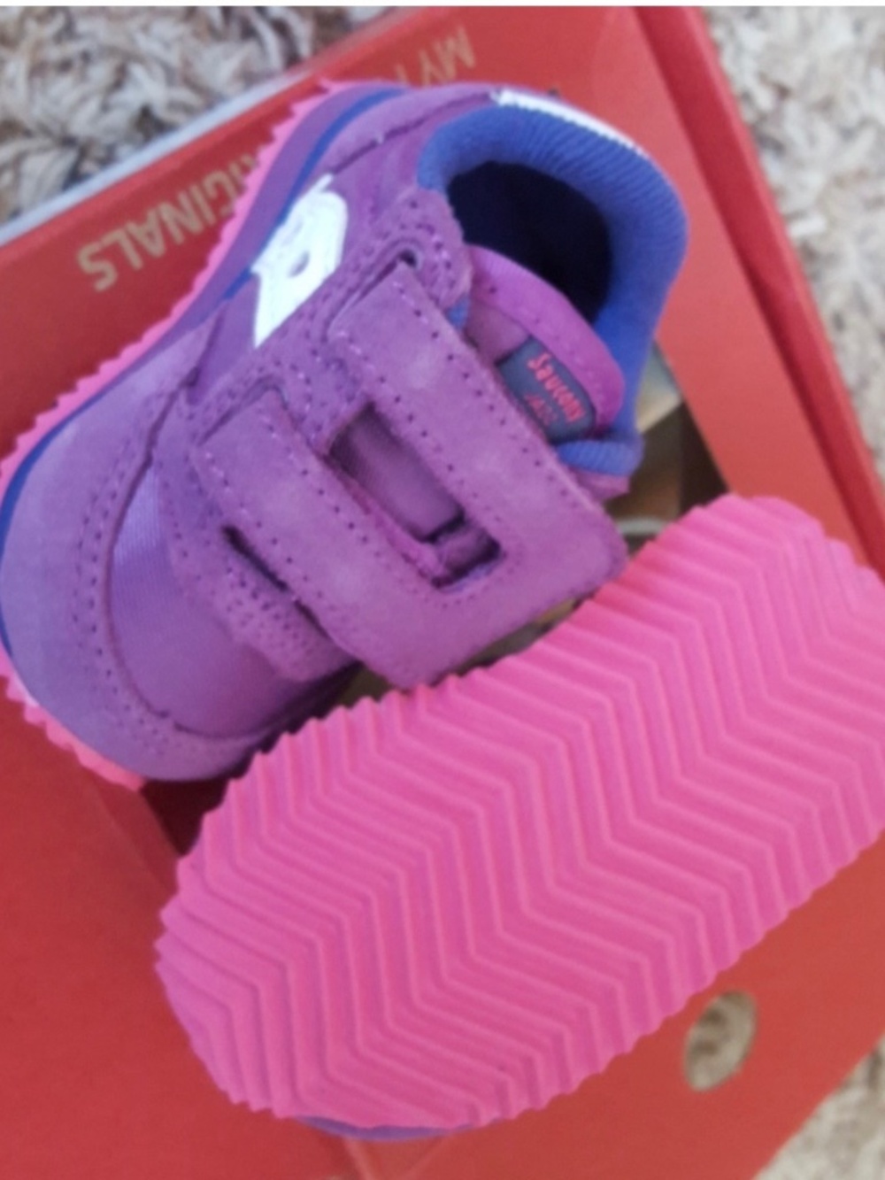 Saucony baby jazz crib shoes in purple and pink